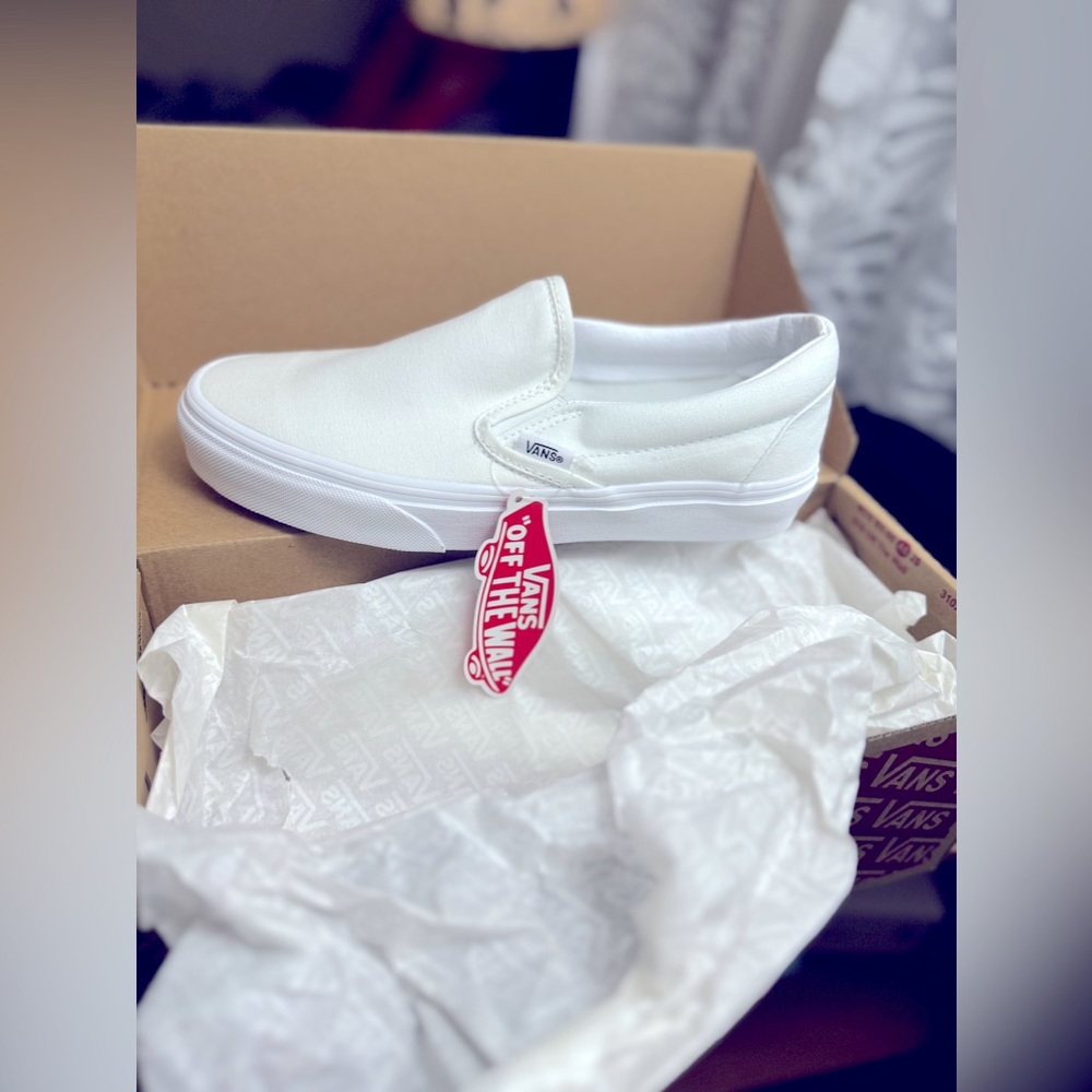 All white- Vans slip ons